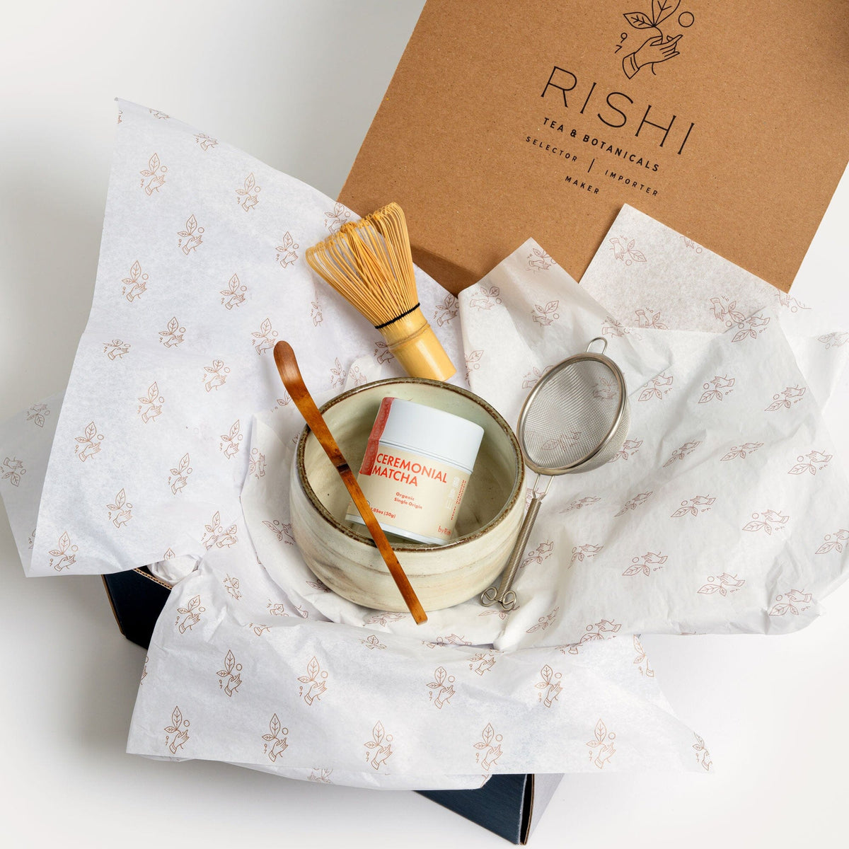 A Ceremonial Matcha Set by Rishi Tea & Botanicals with a cup and a spoon in it.