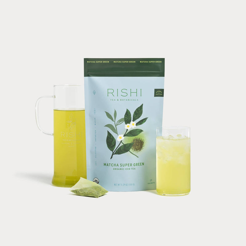 Rishi Matcha Super Green Iced Tea package with a Simple Brew and glass of tea on a white background