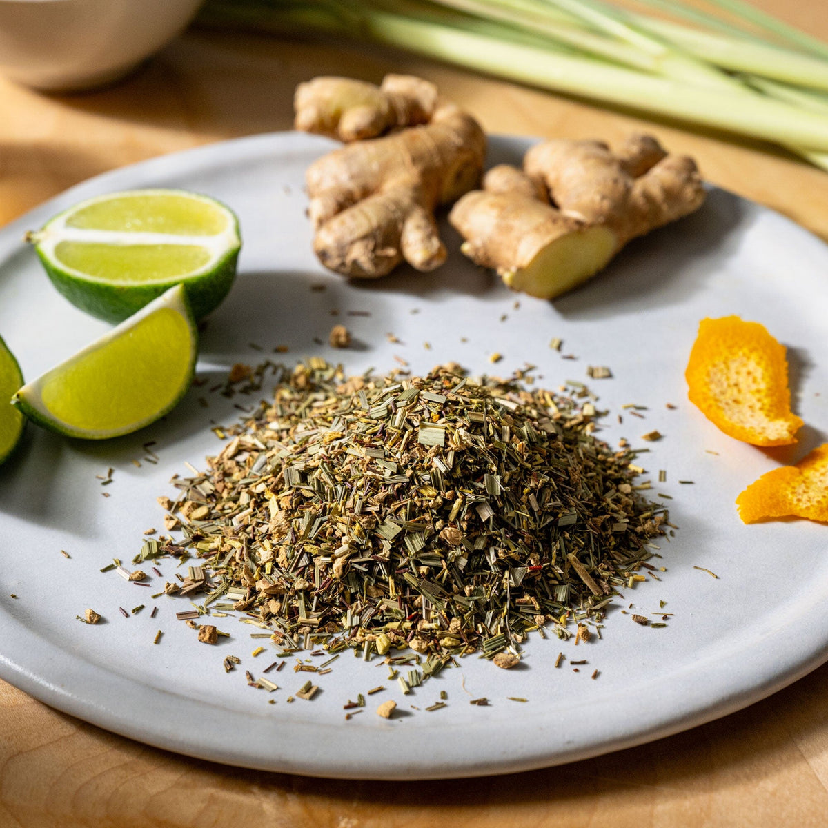 A white plate with Ginger Lime Rooibos from Rishi Tea & Botanicals on it.