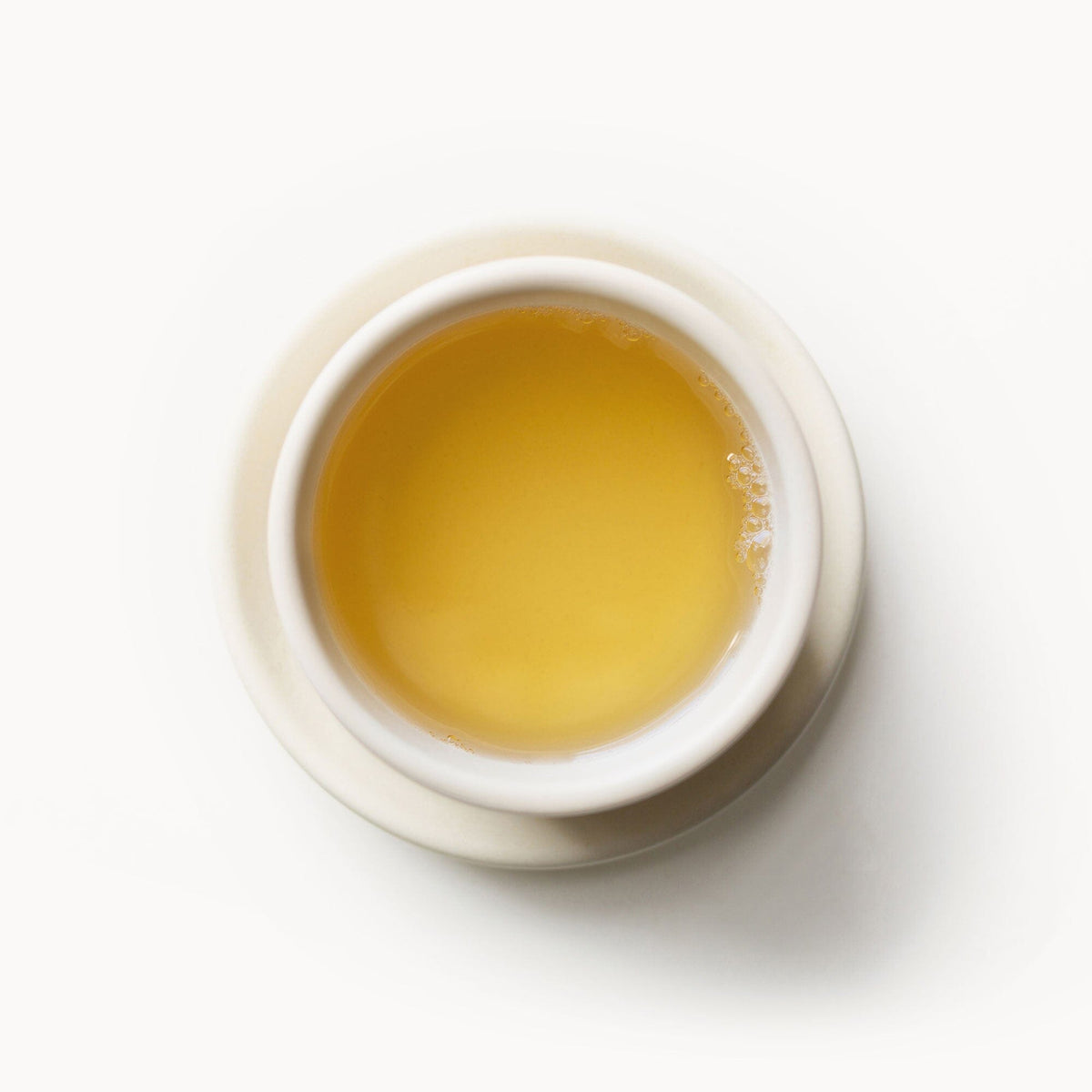A cup of Greek Mountain Tea by Rishi Tea & Botanicals on a white background.