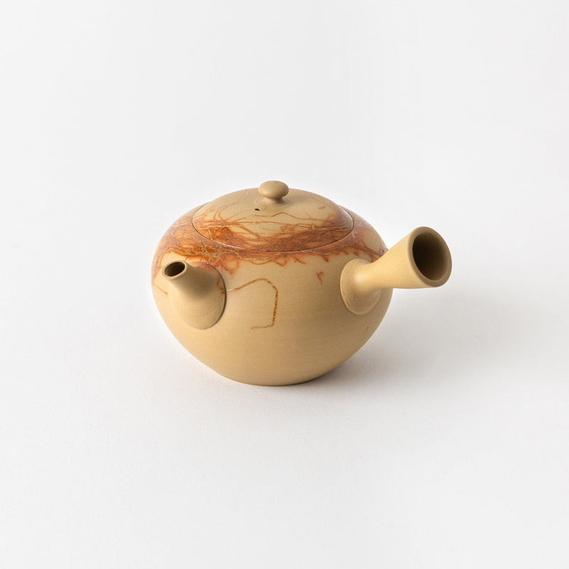 Beige ceramic Tokoname kyusu teapot by Chato Co., Ltd., featuring a side handle, short spout, lid, and brown marbled top pattern. Limited-edition piece displayed on a plain white background.