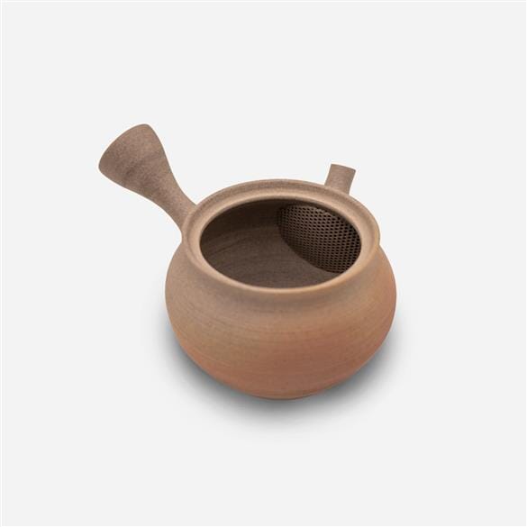 A Cera-Mesh Kyusu Teapot with a wooden handle made of clay, placed on a white background. (Brand: Rishi Tea & Botanicals)